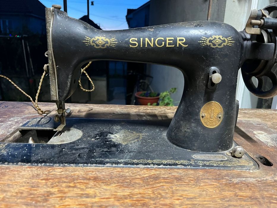 Mașină de cusut model vechi
