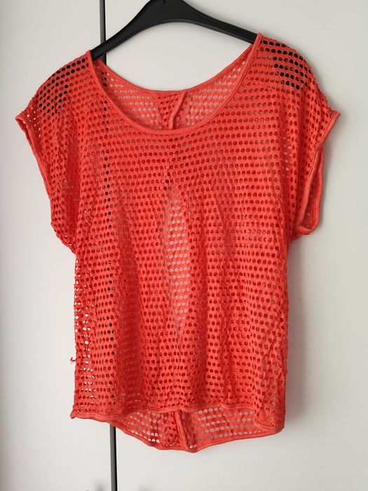 Bluza perforată cu fundițe