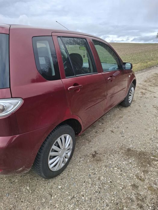 Mazda 2 an 2007 Recent Adusa