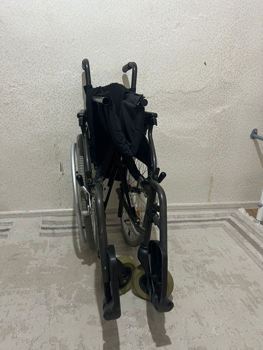Инвалидная коляска