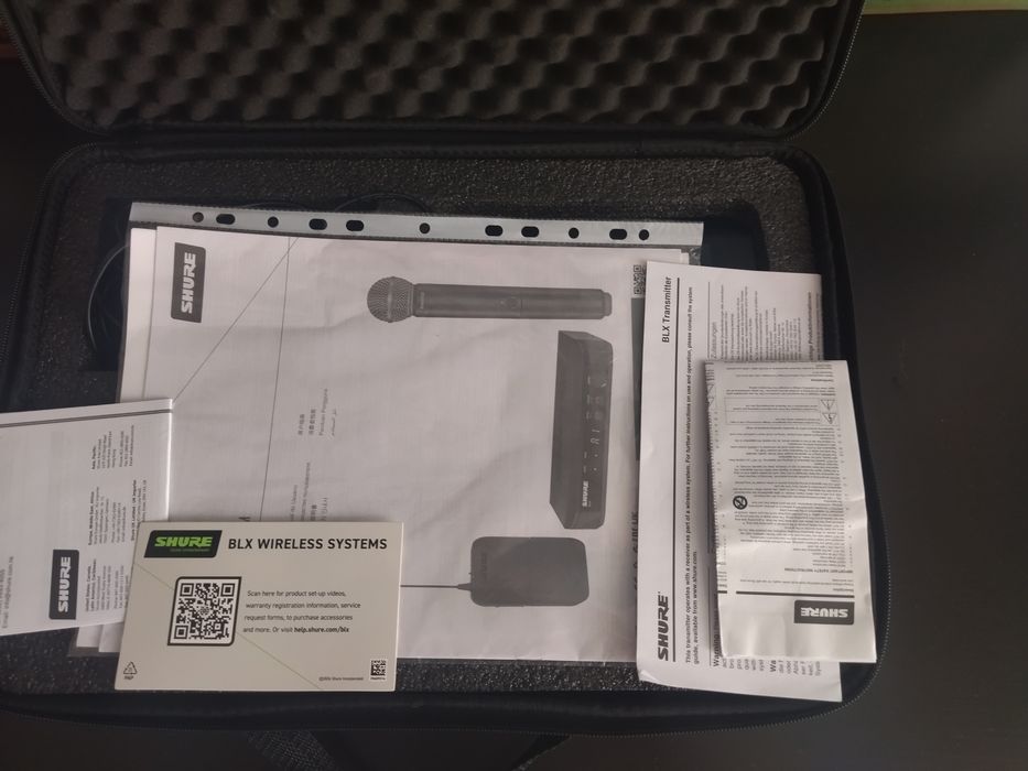 Microfon Shure profesionalcu accesorii și garanție