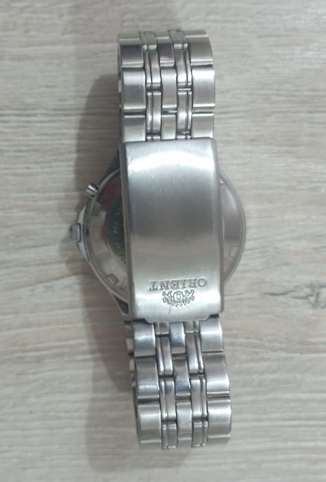 Часы  Orient  три звезды б/у