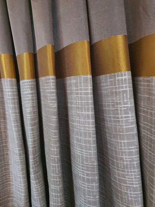 Завеси два броя 75 лева.