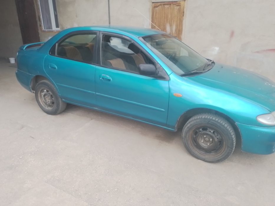 Мазда 323 ВА фамилия