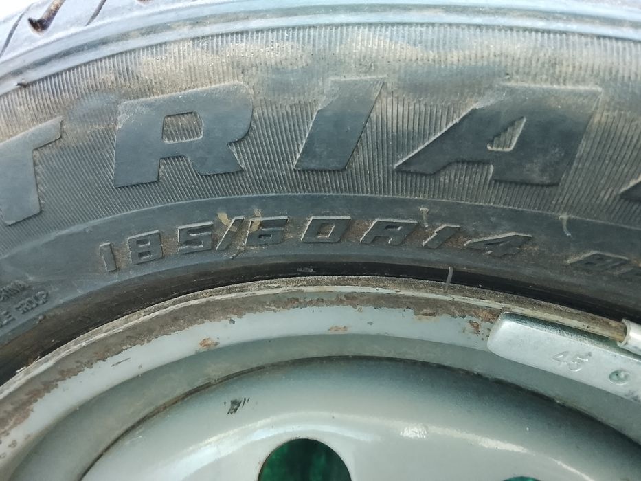 Шину с диском 185/60R14
