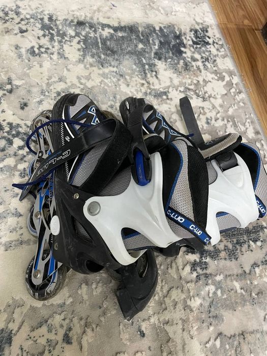 Роликовые коньки