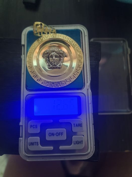 Aur medalion versace