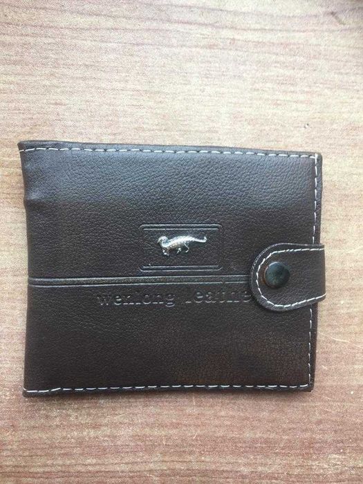 Кошелек (әмиян) сатылады.