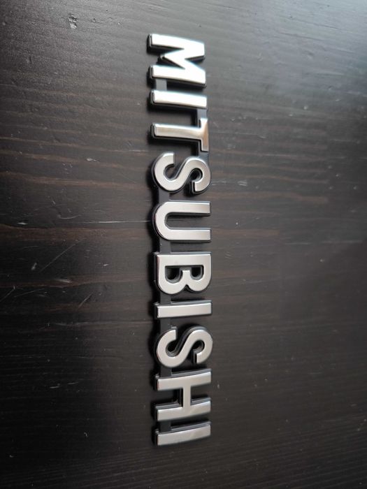 Емблеми Mitsubishi Outlander PHEV III