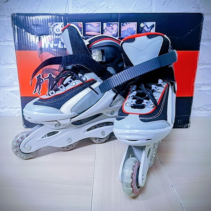 Роликовые коньки