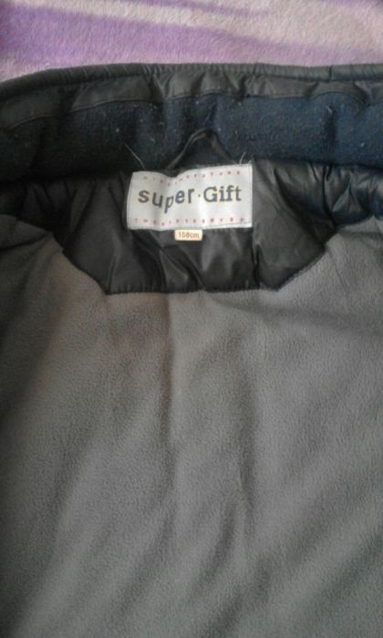 Продам пуховик на подростка