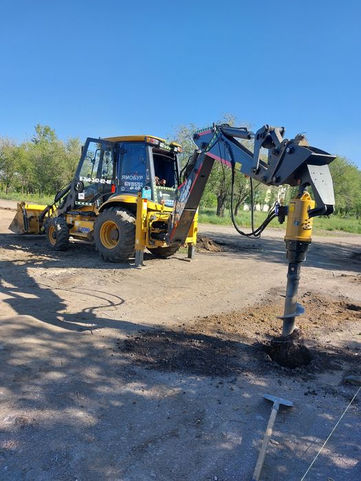 Услуги экскаватора погрузчика три в одном