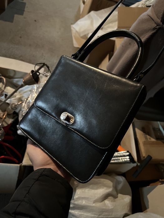 Poseta piele aproape noua