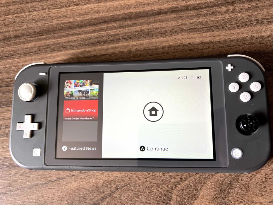 Nintendo switch lite grey + 128gb sd card