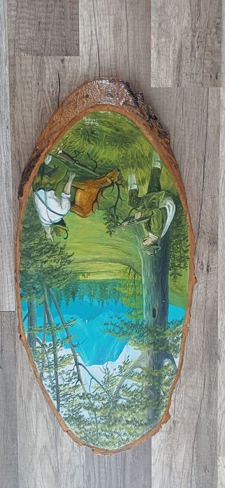 Tablouri pictate pe trunchi de copac