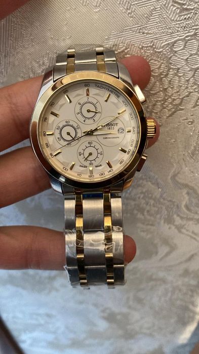 TISSOT 1853………..