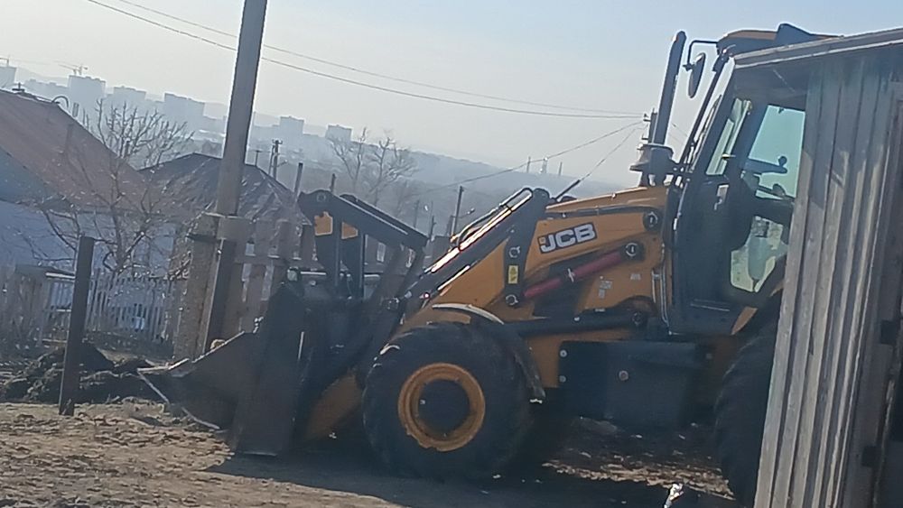 Услуги экскаватора погрузчика