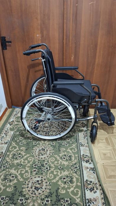 Инвалидная коляска