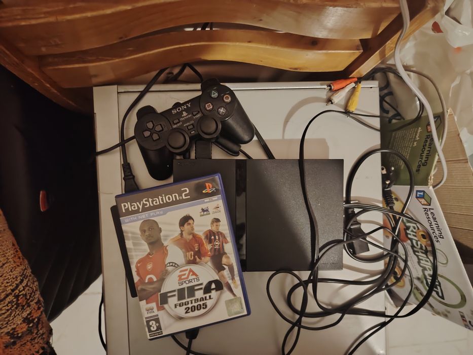 PlayStation 2 Slim + PlayStation 1 + 10 игри + кабели