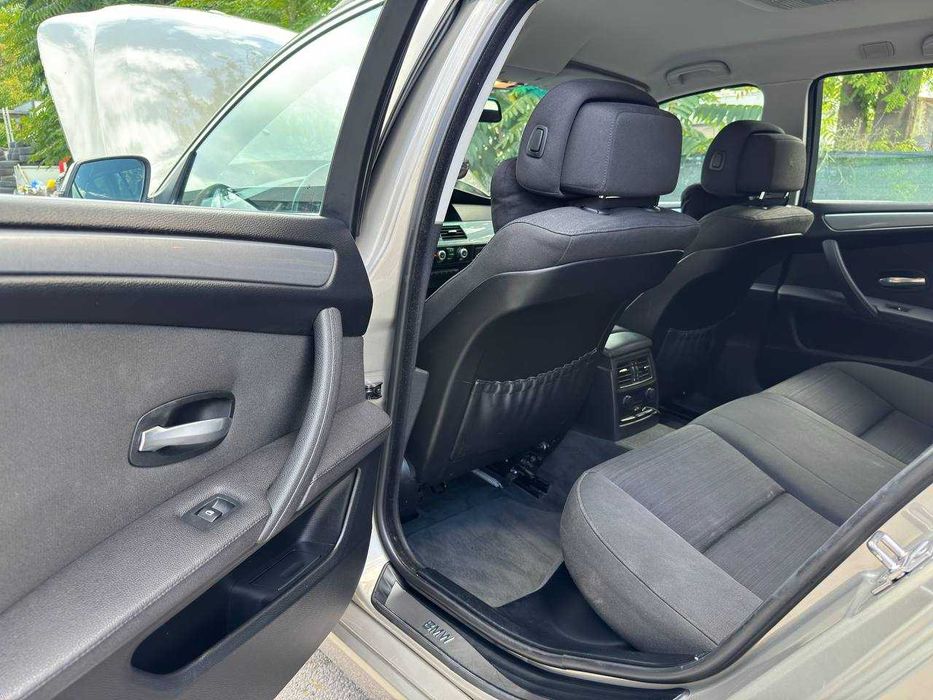 Aвтомобил BMW e61 2.0d