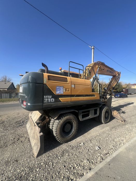Колесный Эксковатор HW 210