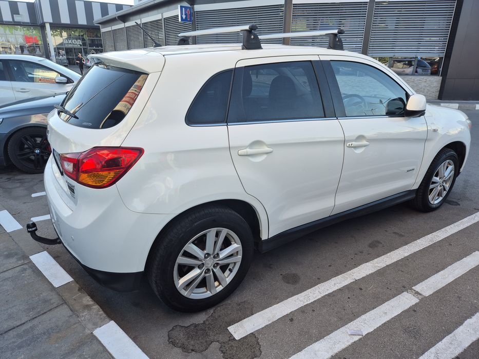 Mitsubishi AXS 2013год.