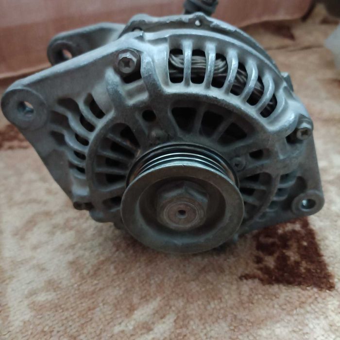 Продам генератор на авто Мазда обьем 1.8
 б.у