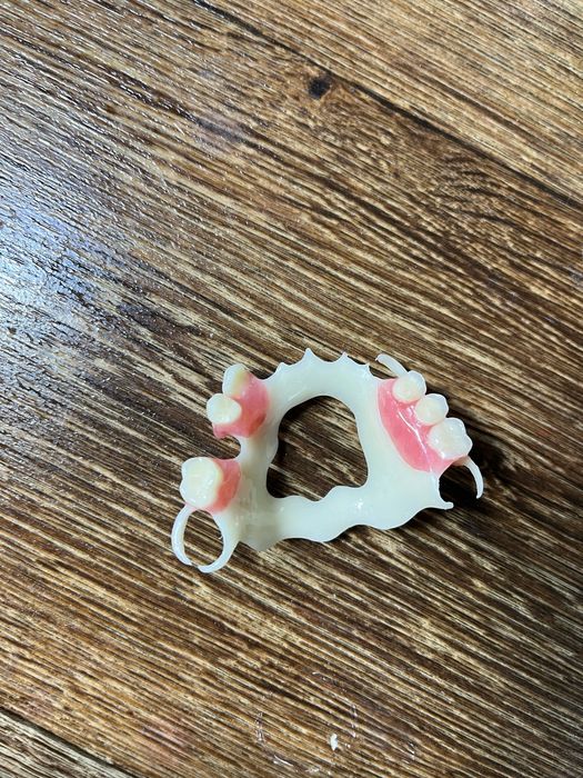 Зубной техник