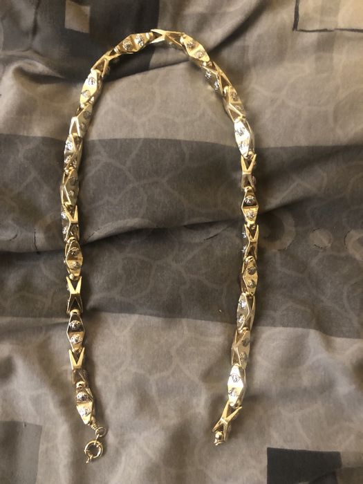 Позлатен ланец нов