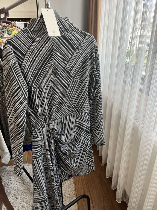 Страхотна рокля.