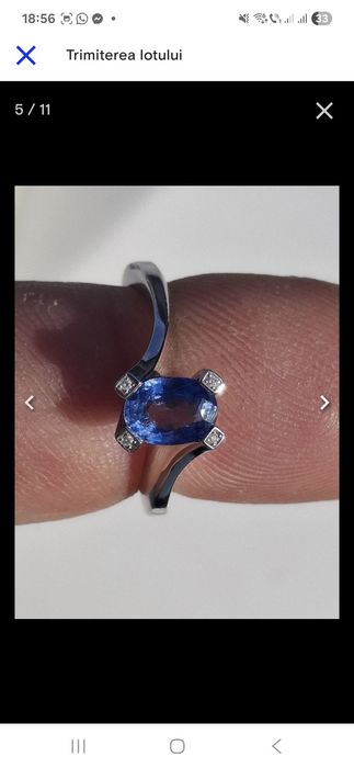 Inel aur alb de 18 k cu safir de 1 carat si 4 diamante