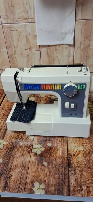 Masina de cusut nechi 559