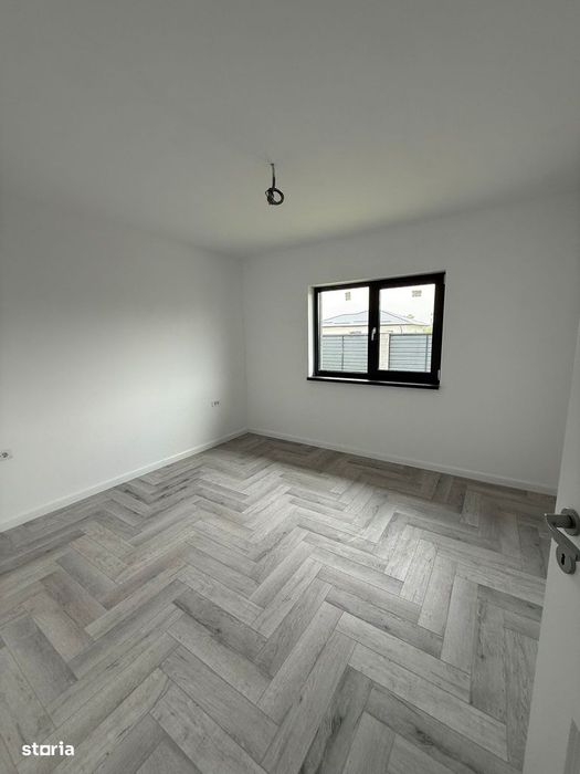 Casa pe parter cu 4 camere , incalzire in pardoseala , teren 400 mp