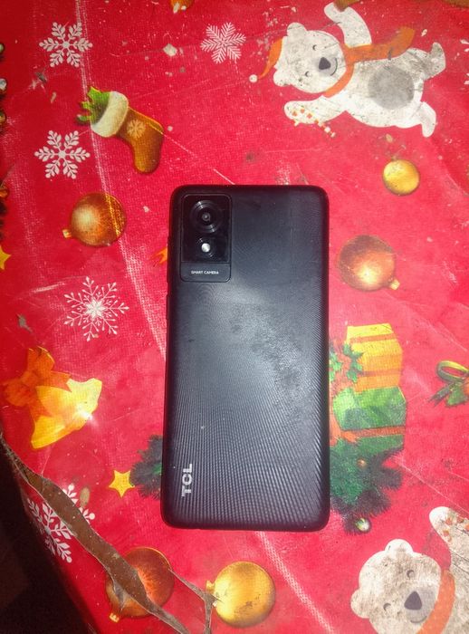 Vând telefon mobil TCL 501