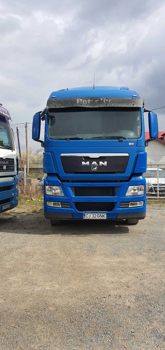 Vand 2 camioane Man si 2 semiremorci Schmitz