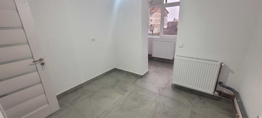 Apartament 2 camere decomandat in Onesti, zona Mall, etaj 1.