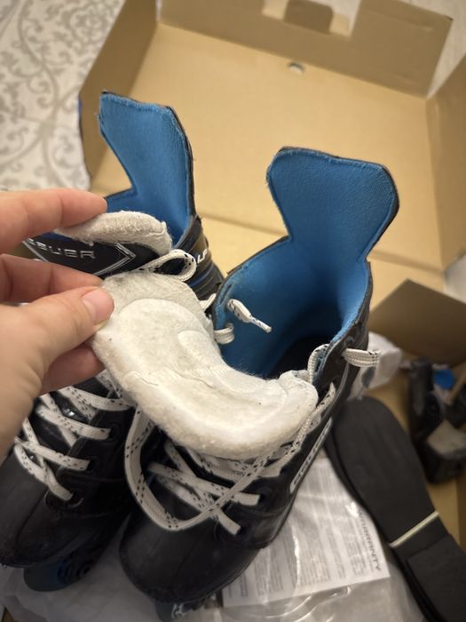 Роликовые коньки