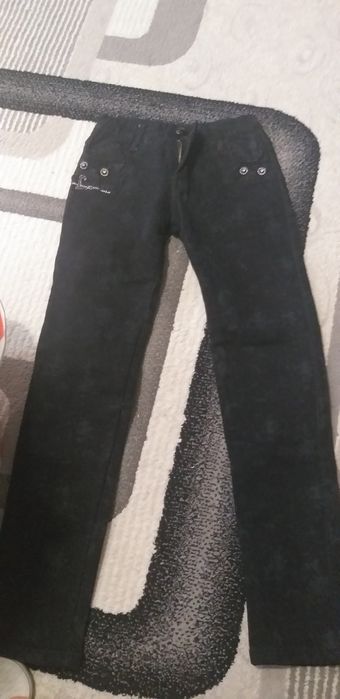 Продам теплые брюки-джинсы на девочек