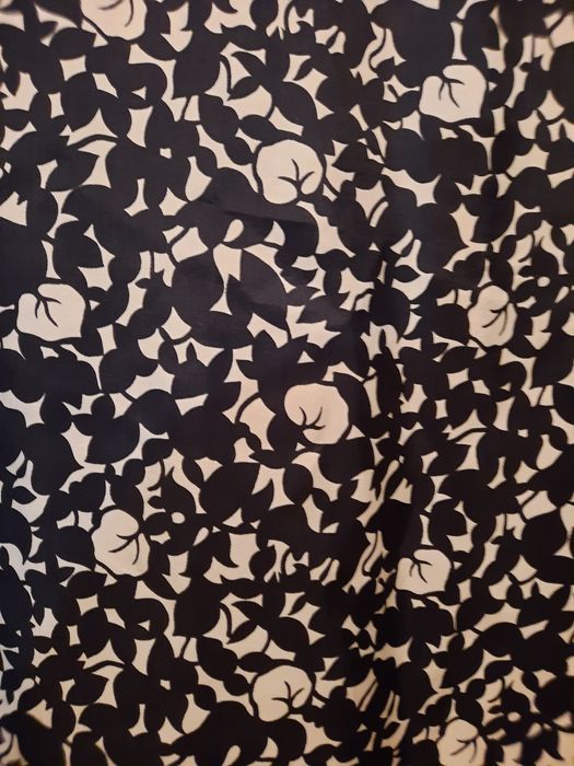 Deosebita bluza negru cu alb mărimea 48-50