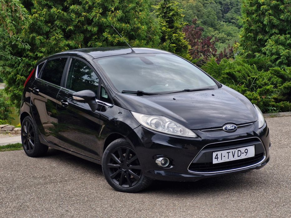 Ford Fiesta 2012 1.6 TDCi 95cp TITANIUM Încălzire in scaune Sony numere valabile xenon Pilot automat
