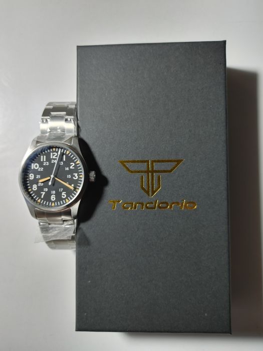 Механические часы с автоподзаводом и механическим заводом.