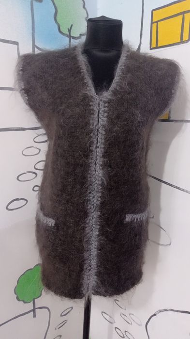 Продам жилет пуховый