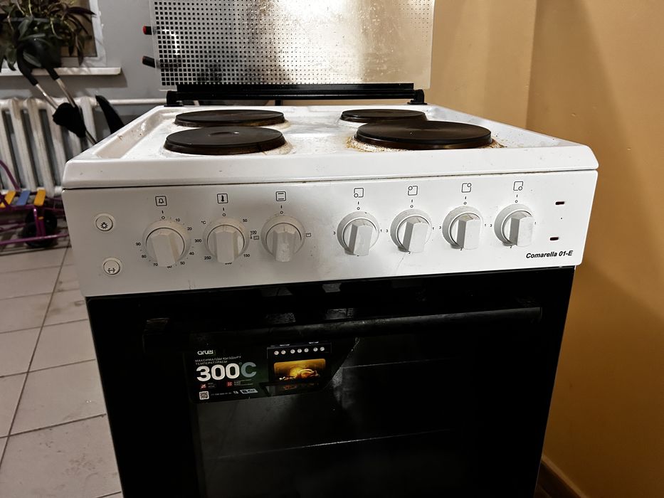 Продам электронный газ плиту