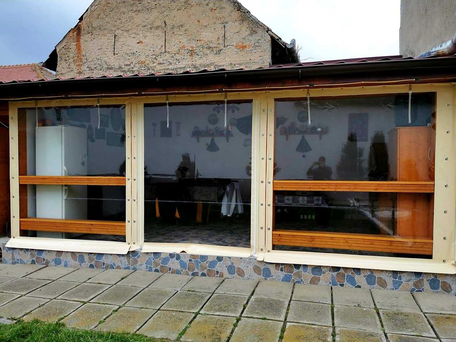 Delgufo - Inchideri terase cu prelata transparenta bride/rulouri/zip