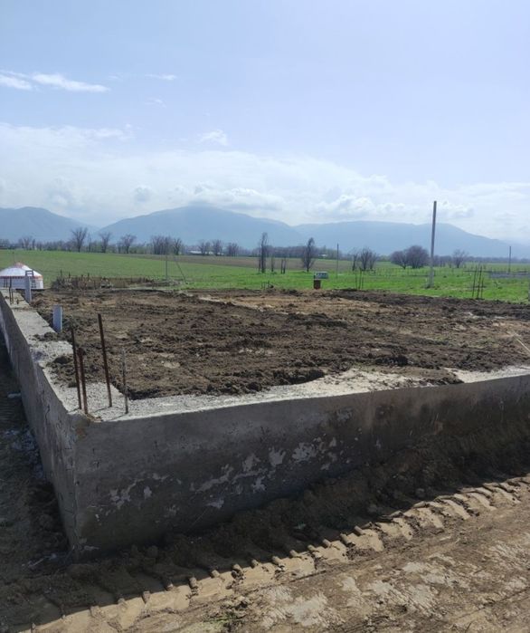 Услуга эксковатора-погрузчика