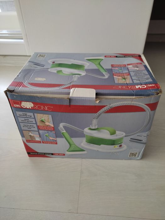 Mașină de călcat cu abur