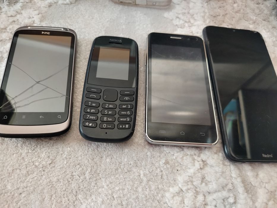 Телефони за части