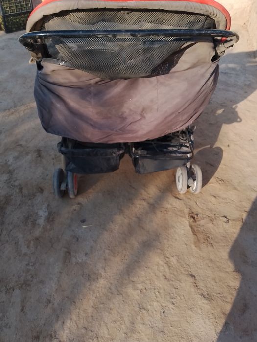 Коляска егизакларга