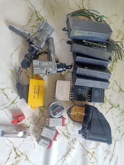 Замок багажника Мерс.124 ешка