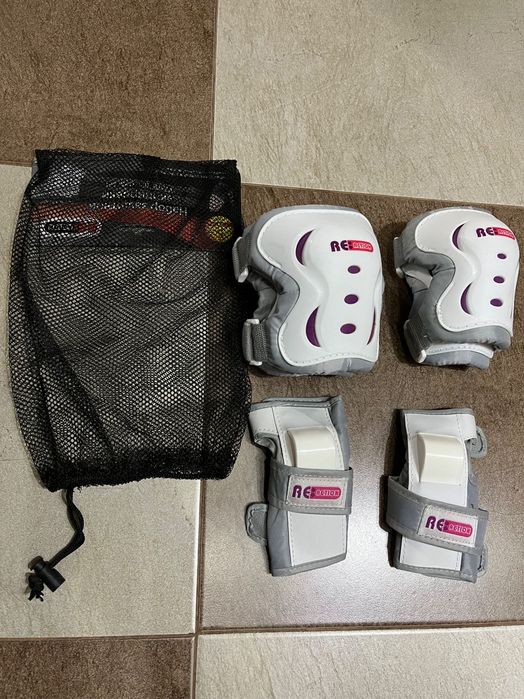 Роликовые коньки